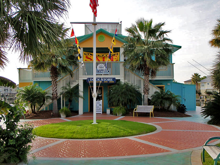 You’ll have to go around this dock store to get to the charter boat. Go to the left to find the Intimidator for Gulf Shores deep sea fishing.